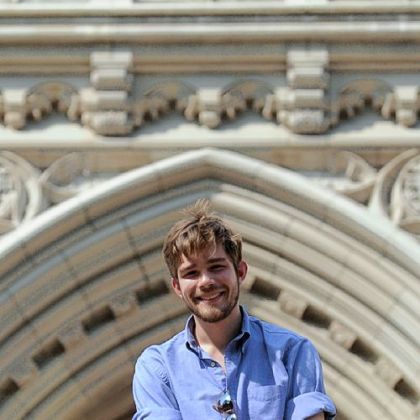 Bryan Marco, a rising senior philosophy major from upstate New York, in front of the Cathedral of Learning at the University of Pittsburgh.